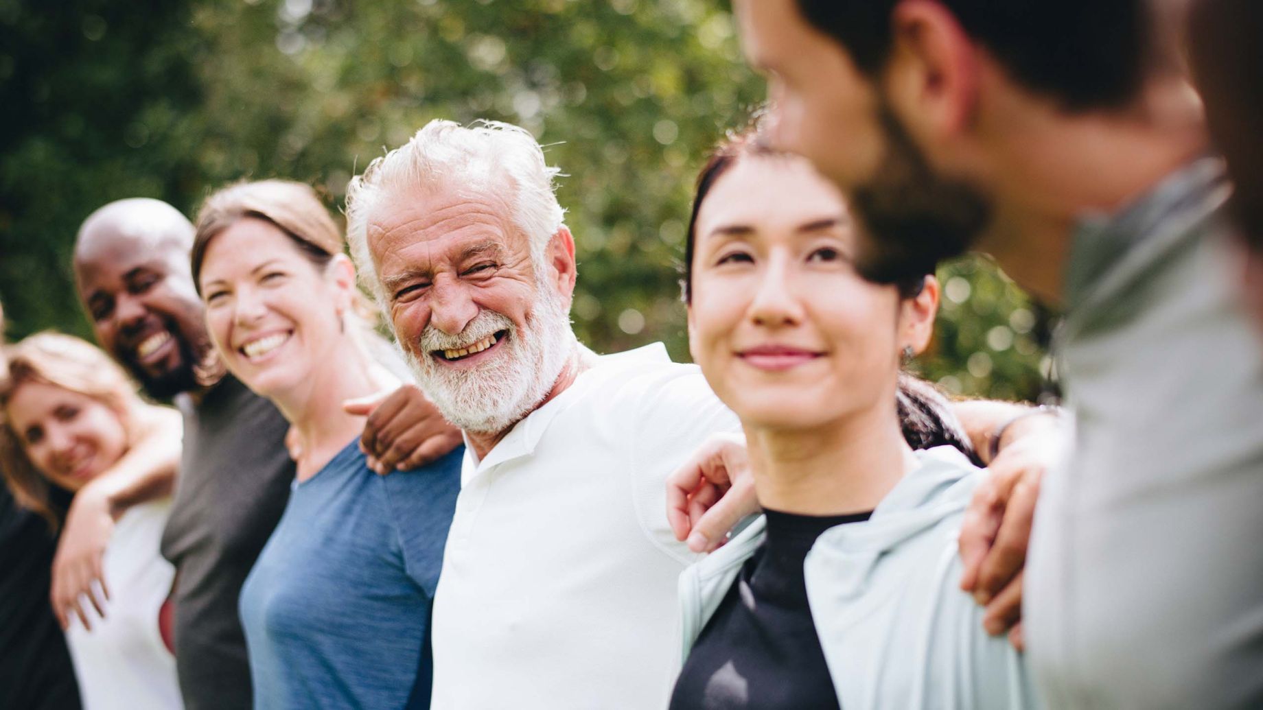 group of community residents smiling having a good time